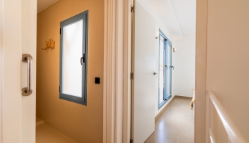 Resa Estates Ibiza sale ted koop Cala Tarida patio townhouse hallway.JPG